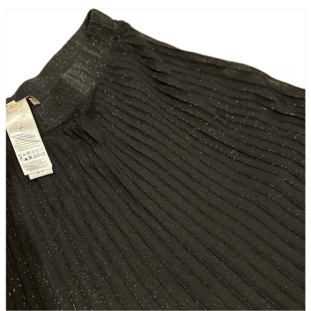Falconieri elastic pleated skirt with a short underskirt. 84 inches long